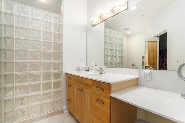 9077 24th Ave, Jenison, MI 49428 - full bathroom featuring vanity, tile patterned flooring, and a shower with curtain
