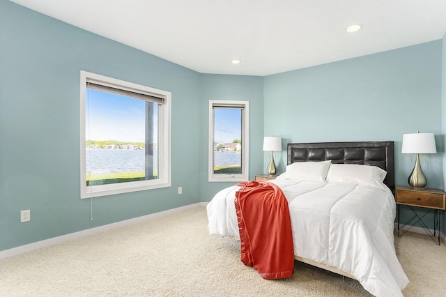 9077 24th Ave, Jenison, MI 49428 - carpeted bedroom with baseboards and recessed lighting