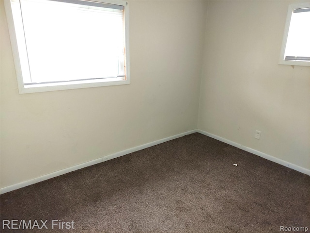 24449 Lauren Ave, Warren, MI 48089 - carpeted spare room featuring healthy amount of natural light and baseboards