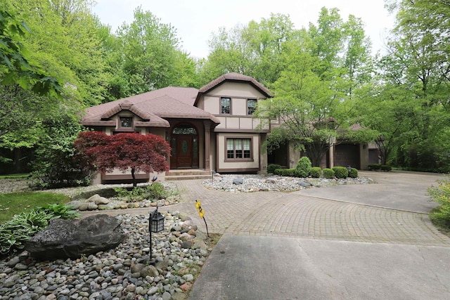 10466 W Farrand Rd, Montrose, MI 48457 - english style home with curved driveway and stucco siding