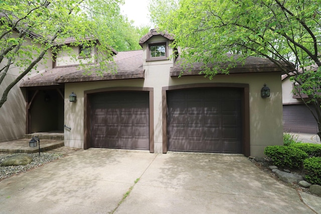 10466 W Farrand Rd, Montrose, MI 48457 - garage featuring concrete driveway