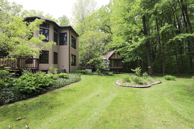 10466 W Farrand Rd, Montrose, MI 48457 - view of green lawn with a deck