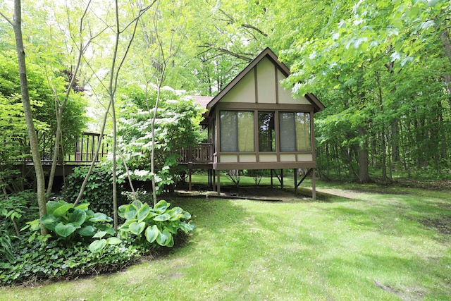 10466 W Farrand Rd, Montrose, MI 48457 - rear view of house with a yard, a sunroom, and a deck