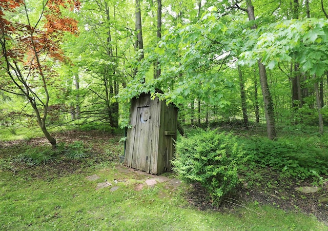 10466 W Farrand Rd, Montrose, MI 48457 - view of yard featuring a forest view