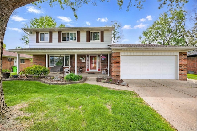39582 Tunstall St, Clinton Township, MI 48038 - traditional-style house with a garage, brick siding, concrete driveway, and a front lawn