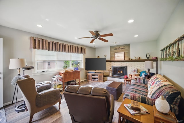 39582 Tunstall St, Clinton Township, MI 48038 - living room featuring ceiling fan, wood finished floors, a brick fireplace, recessed lighting, and baseboards