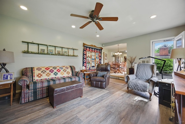 39582 Tunstall St, Clinton Township, MI 48038 - living area featuring wood finished floors, ceiling fan, recessed lighting, and a chandelier
