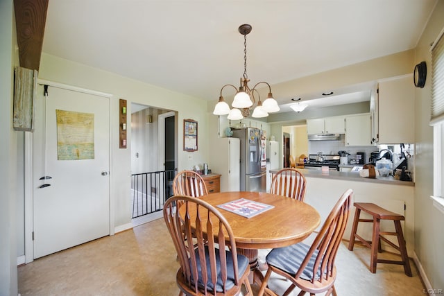39582 Tunstall St, Clinton Township, MI 48038 - dining room featuring a chandelier and light floors