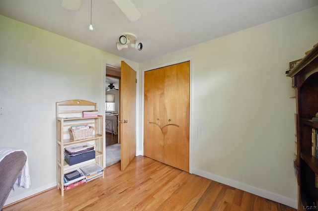 39582 Tunstall St, Clinton Township, MI 48038 - bedroom featuring light wood-type flooring, baseboards, a closet, and ceiling fan