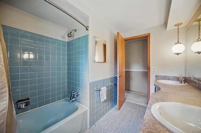 39582 Tunstall St, Clinton Township, MI 48038 - bathroom featuring double vanity, bathtub / shower combination, tile patterned floors, and tile walls