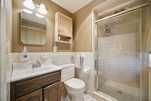 39582 Tunstall St, Clinton Township, MI 48038 - full bathroom featuring vanity, toilet, a shower stall, wainscoting, and tile patterned floors