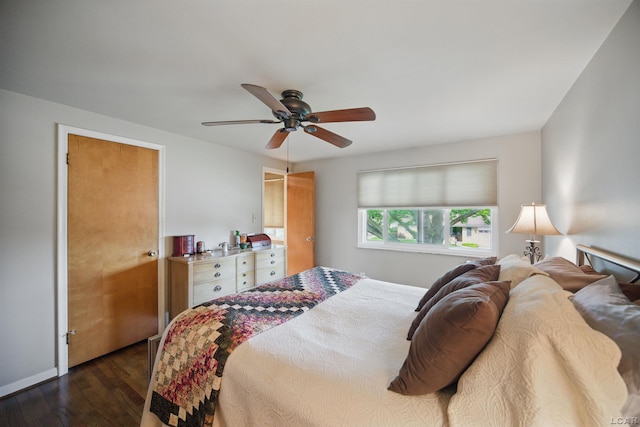 39582 Tunstall St, Clinton Township, MI 48038 - bedroom featuring dark wood-style floors, a ceiling fan, and baseboards