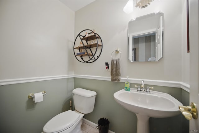 39582 Tunstall St, Clinton Township, MI 48038 - bathroom with toilet, tile patterned flooring, and baseboards