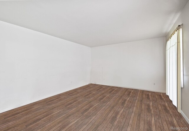 4603 Hedgewood, Bloomfield Hills, MI 48301 - empty room with dark wood-type flooring