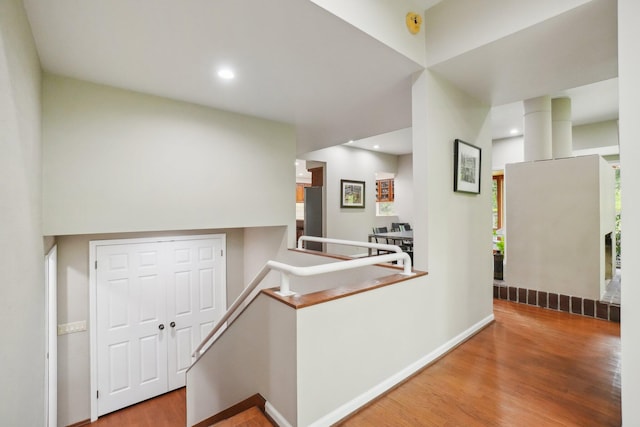 3805 Penberton Ct, Ann Arbor, MI 48105 - corridor featuring an upstairs landing, wood finished floors, baseboards, and recessed lighting