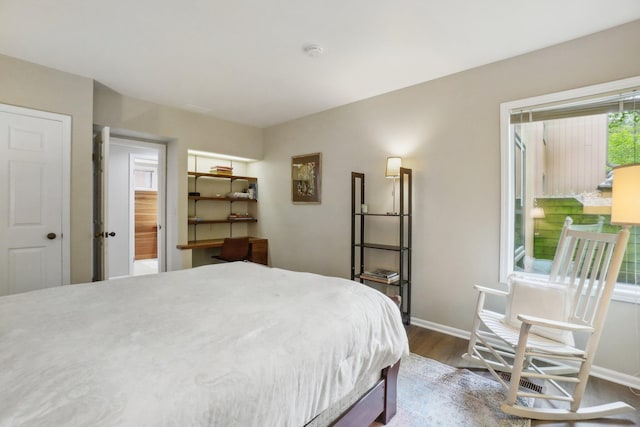3805 Penberton Ct, Ann Arbor, MI 48105 - bedroom featuring dark wood-style flooring and baseboards