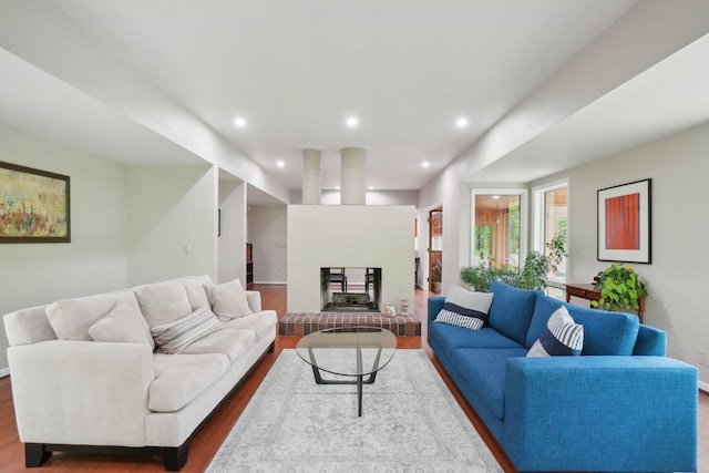 3805 Penberton Ct, Ann Arbor, MI 48105 - living area with wood finished floors, a fireplace, and recessed lighting