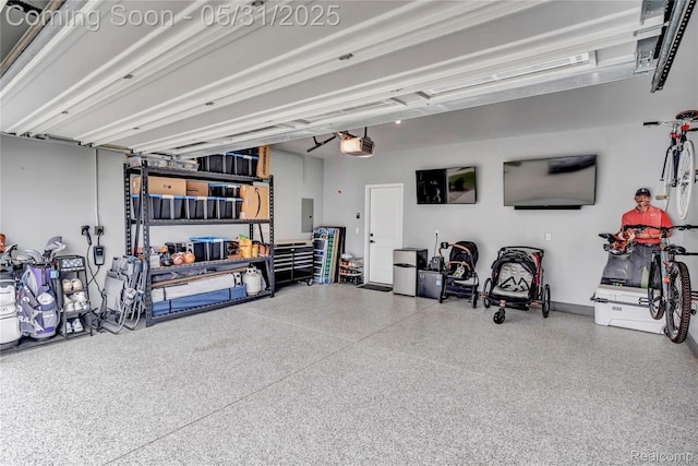 8811 Pioneer St, Washington, MI 48094 - garage with a garage door opener and electric panel