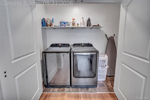 8811 Pioneer St, Washington, MI 48094 - laundry area with washing machine and clothes dryer