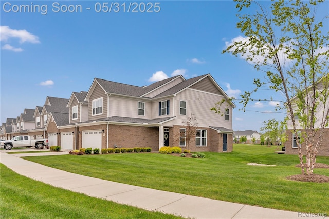 8811 Pioneer St, Washington, MI 48094 - view of front facade featuring an attached garage, brick siding, a residential view, a front yard, and concrete driveway