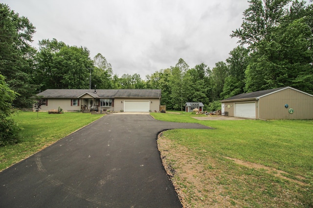 21729 Pinhook Rd, Mendon, MI 49072 - view of front of property with a front yard, an outdoor structure, and a detached garage