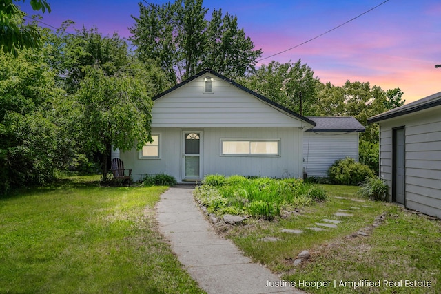2257 Iroquois Trl, Hastings, MI 49058 - view of front of property featuring a front lawn