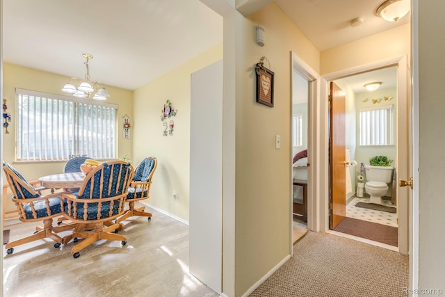 34043402 Appomattox Dr, Port Huron, MI 48060 - dining room with a chandelier, baseboards, and wood finished floors