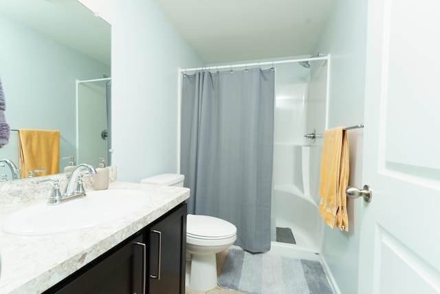 19909 W Breton Ct, Chelsea, MI 48118 - full bath featuring toilet, vanity, and a shower with shower curtain