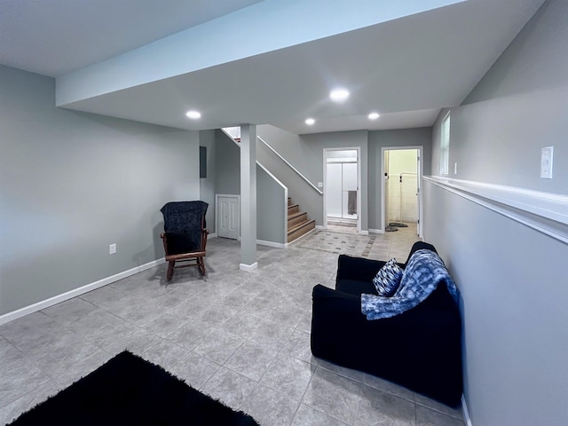 5098 N Center Rd, Flint, MI 48506 - living area with recessed lighting, light tile patterned floors, stairs, and baseboards