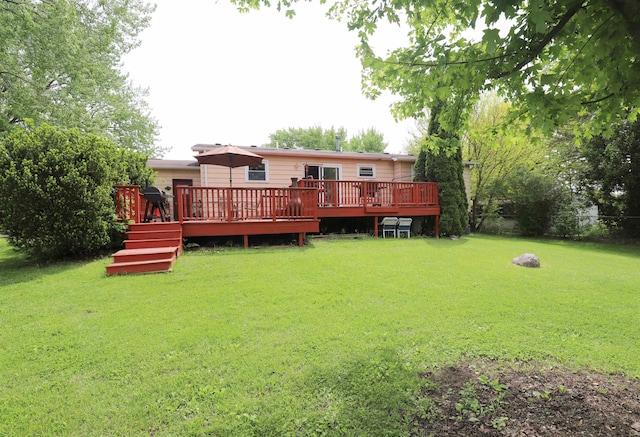 1029 N Linden Rd, Flint, MI 48532 - back of property with a lawn and a deck
