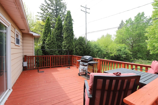 1029 N Linden Rd, Flint, MI 48532 - deck with outdoor dining area and area for grilling