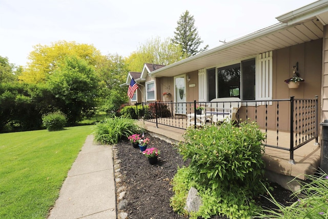 1029 N Linden Rd, Flint, MI 48532 - view of side of home featuring a lawn