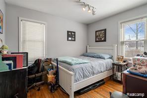 1760 Cole St, Birmingham, MI 48009 - bedroom featuring wood finished floors