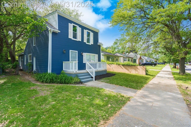 16565 Winston St, Detroit, MI 48219 - view of front of house featuring a front yard