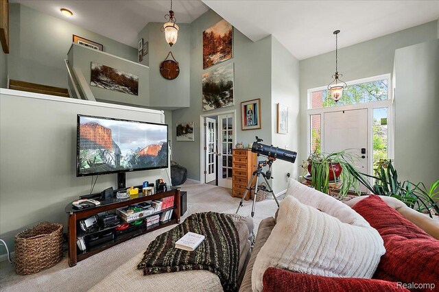 3796 Briarbrooke Ln, Rochester, MI 48306 - carpeted living room featuring high vaulted ceiling and french doors