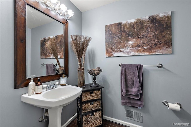 3796 Briarbrooke Ln, Rochester, MI 48306 - bathroom with wood finished floors and baseboards