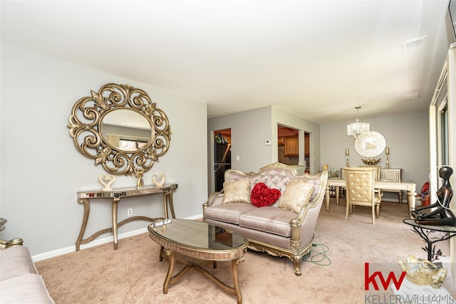 24327 Evergreen Rd, Southfield, MI 48075 - living area with light carpet, a chandelier, and baseboards