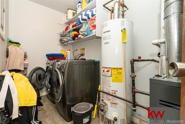 24327 Evergreen Rd, Southfield, MI 48075 - washroom featuring separate washer and dryer and water heater