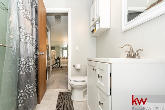 24327 Evergreen Rd, Southfield, MI 48075 - full bath with toilet, vanity, and tile patterned flooring