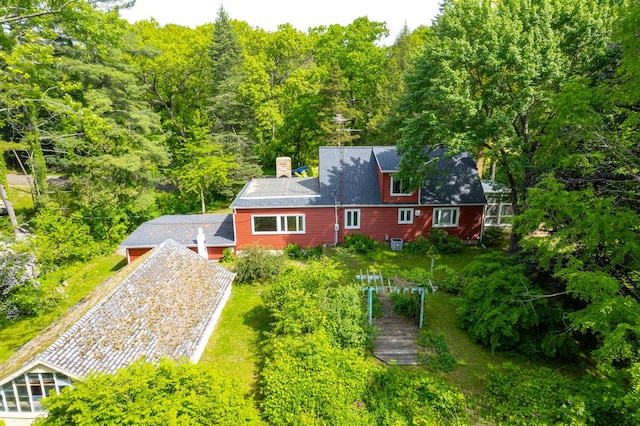 7938 E Dr N, Battle Creek, MI 49014 - aerial view of property and surrounding area featuring a forest