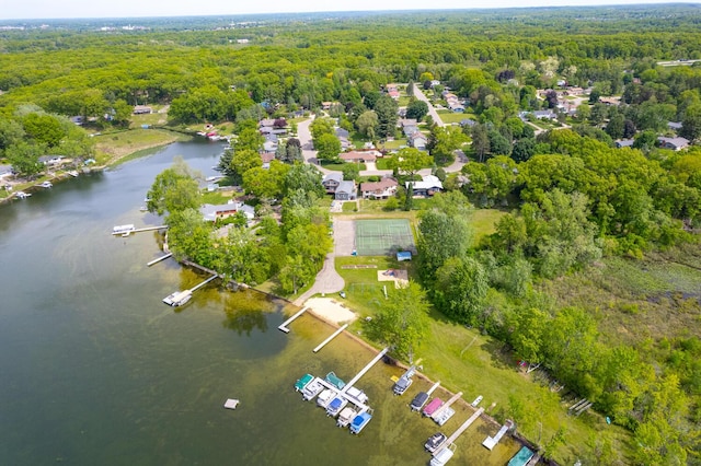 7938 E Dr N, Battle Creek, MI 49014 - aerial view of property and surrounding area with a heavily wooded area and a large body of water