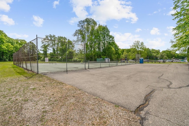 7938 E Dr N, Battle Creek, MI 49014 - view of tennis court with view of scattered trees