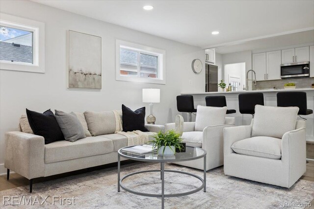 31111 Angeline Ct E, Saint Clair Shores, MI 48082 - living room featuring recessed lighting and light wood-type flooring