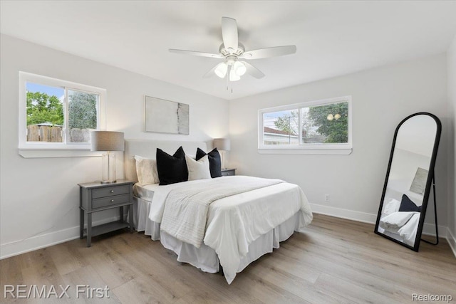 31111 Angeline Ct E, Saint Clair Shores, MI 48082 - bedroom featuring light wood-style floors, baseboards, and ceiling fan