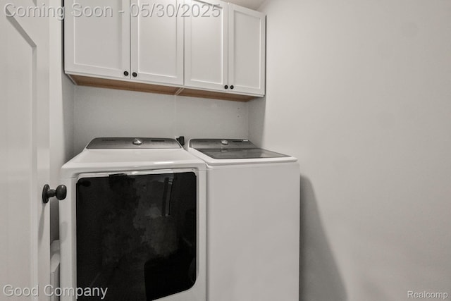 2520 Ellwood Ave, Berkley, MI 48072 - washroom featuring cabinet space and separate washer and dryer