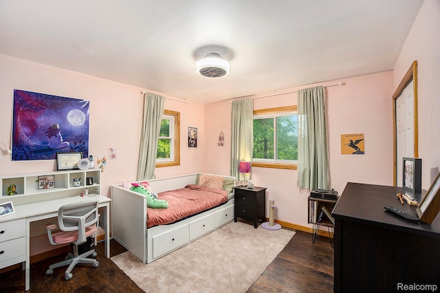 1295 Kern Rd, Oakland, MI 48363 - bedroom featuring wood finished floors, an office area, and baseboards
