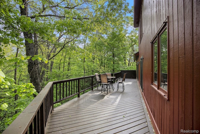 1295 Kern Rd, Oakland, MI 48363 - wooden terrace with outdoor dining area
