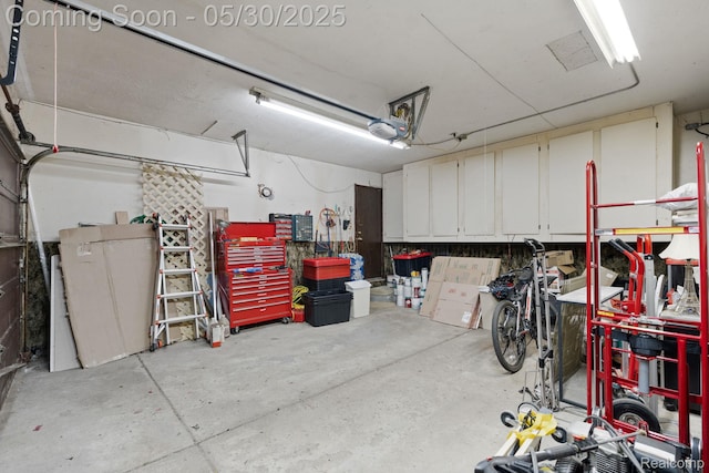 9495 Continental Dr, Taylor, MI 48180 - garage featuring a garage door opener