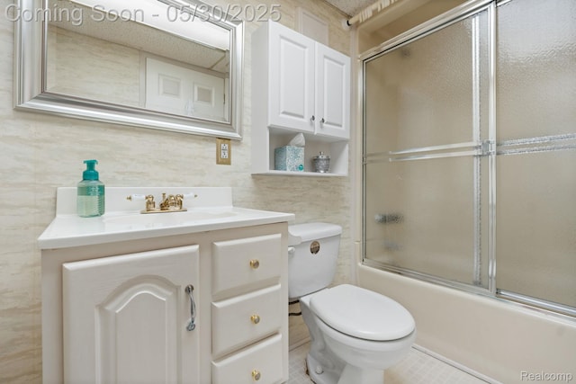 9495 Continental Dr, Taylor, MI 48180 - full bathroom with toilet, vanity, shower / bath combination with glass door, and tile patterned floors