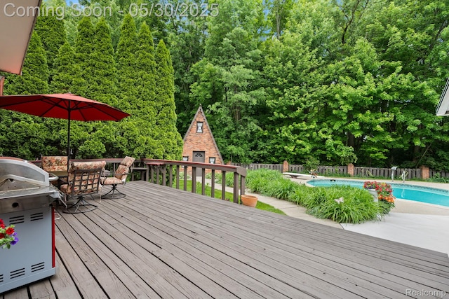 9495 Continental Dr, Taylor, MI 48180 - deck featuring outdoor dining area and a grill